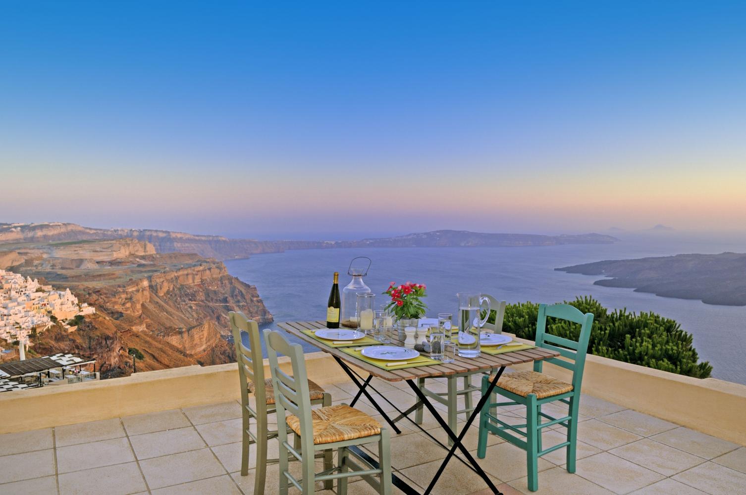 Luxury private villa with pool overlooking the volcanic landscape of Santorini, Greek islands