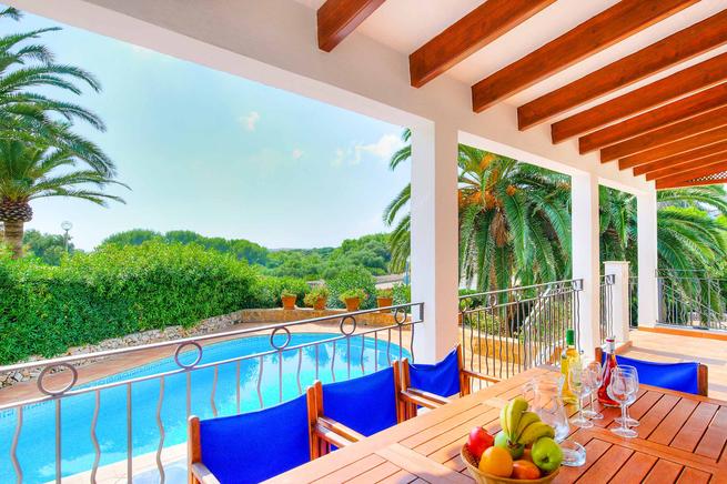 Charming villa is located in Binibèquer, Menorca  and overlooking the beach.