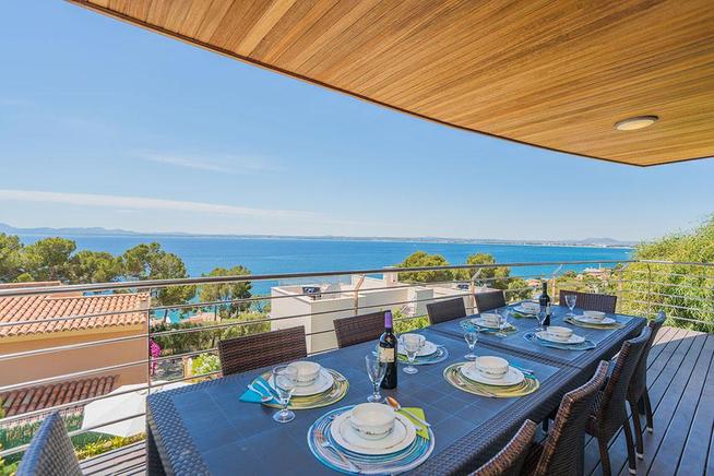 Superb frontline villa for rent in Puerto Alcudia, Mallorca